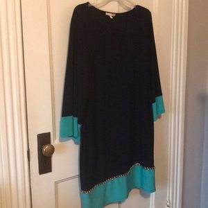 Brand new mod-style dress, for day or nigh-time.